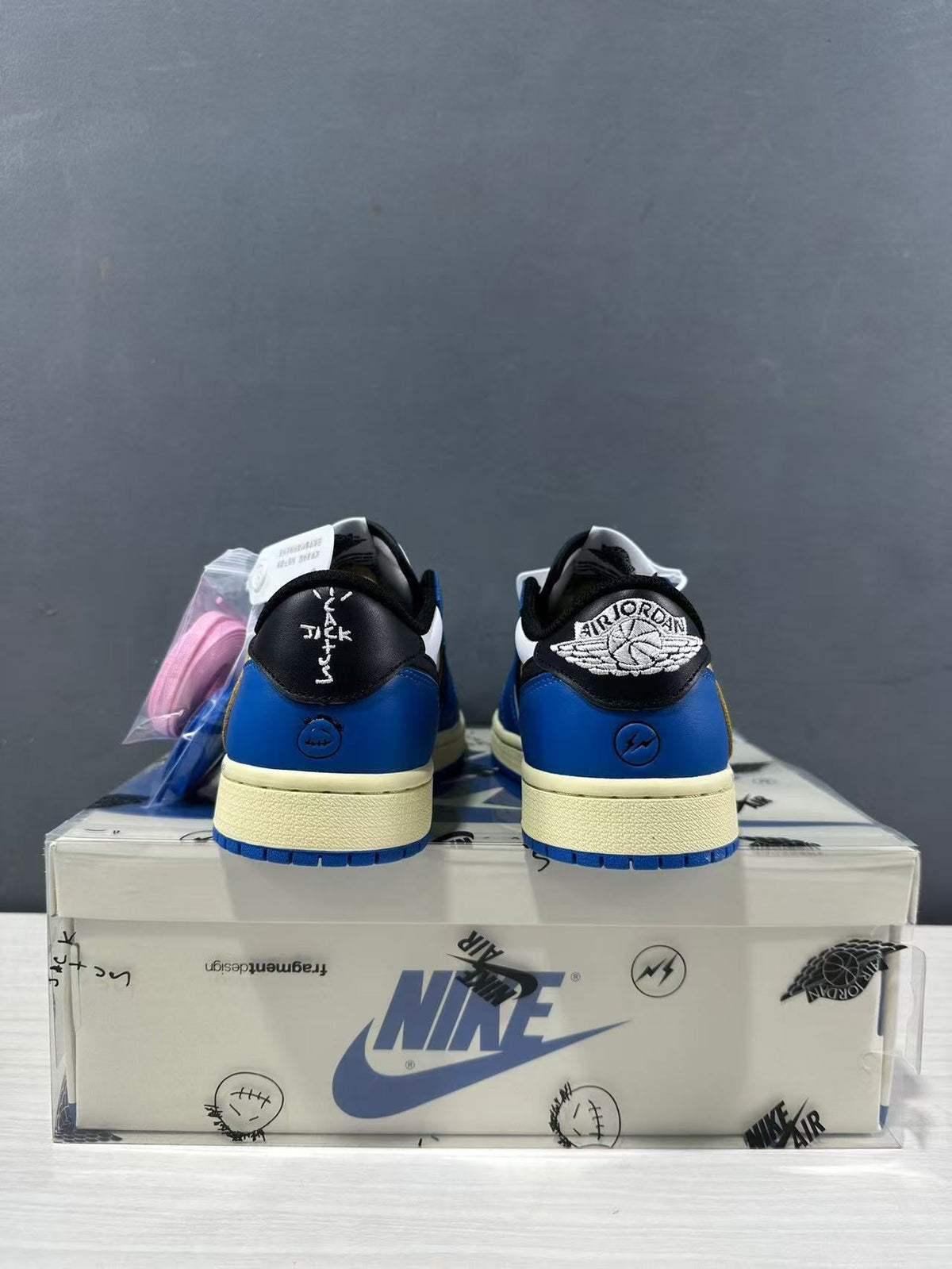 Jordan 1 Low Travis Scott Fragment in Blue White DM7866-141 - product image from the listing.
