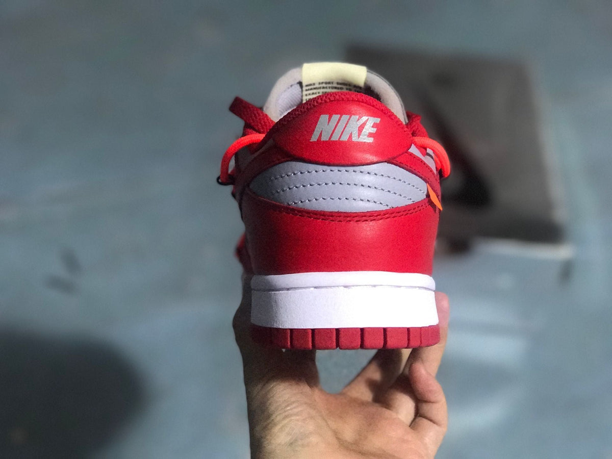 Nike Dunk Low LTHR / OW Sneakers in Red Gray CT0856-600 - product image from the listing.
