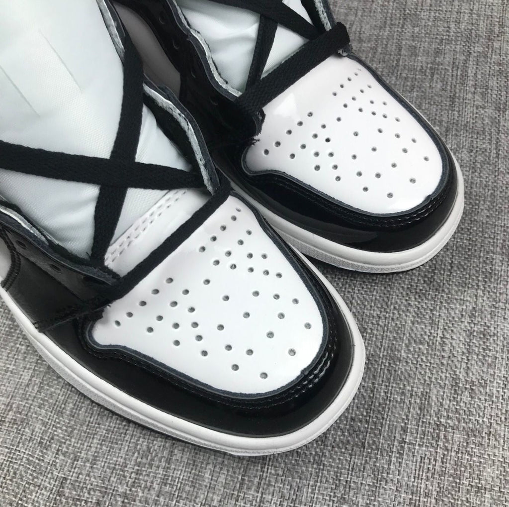 Air Jordan 1 Mid Sneakers in Black White Metallic Gold 852542-007 - product image from the listing.
