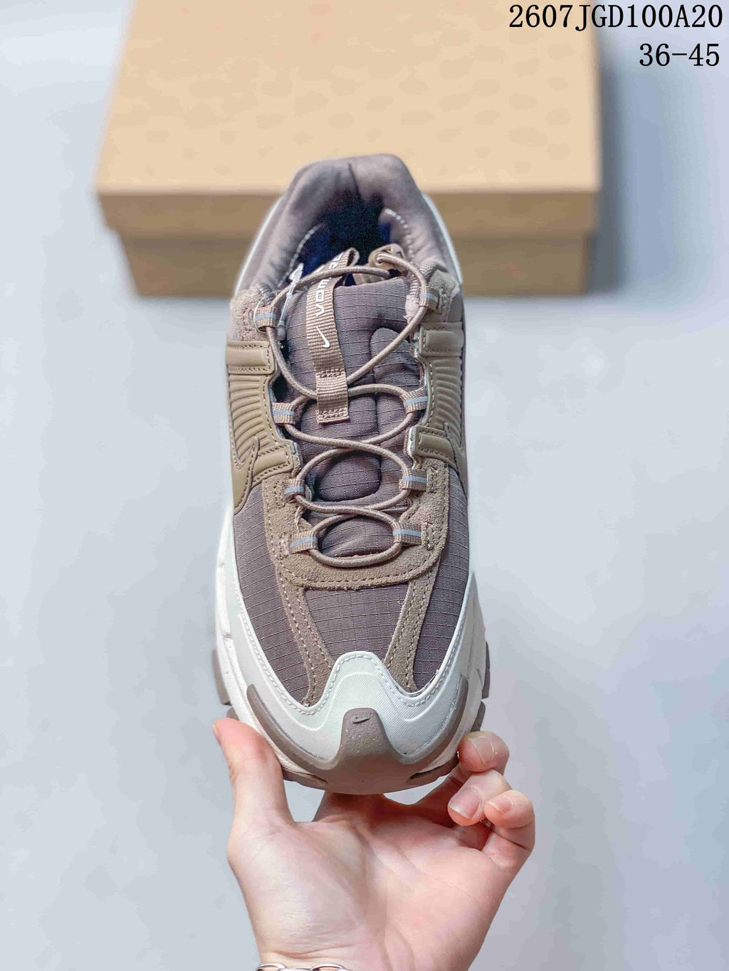 Nike Zoom Vomero Roam Sneakers in Taupe Gray 2607JGD100A20 - product image from the listing.