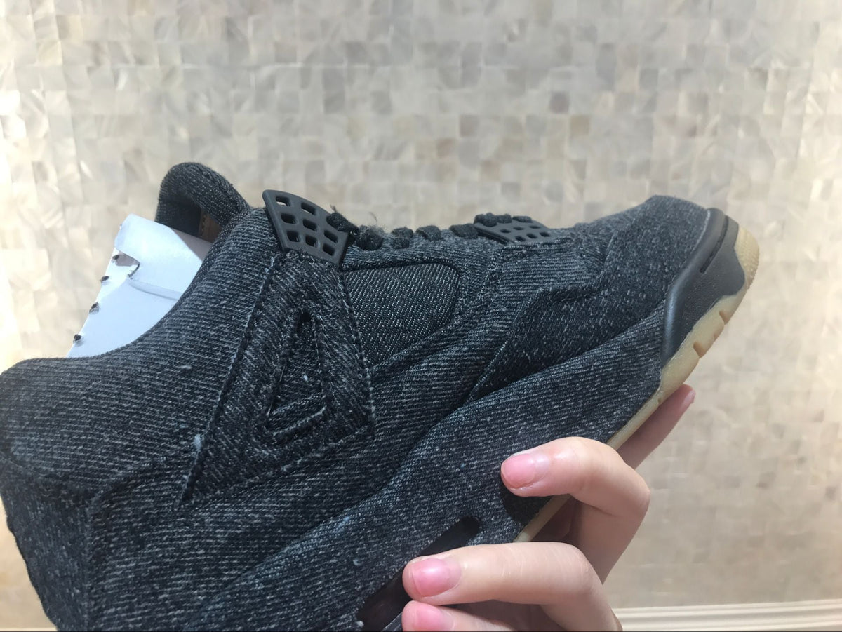 Jordan 4 Retro Levi's Sneakers in Black Denim A02571-001 - product image from the listing.