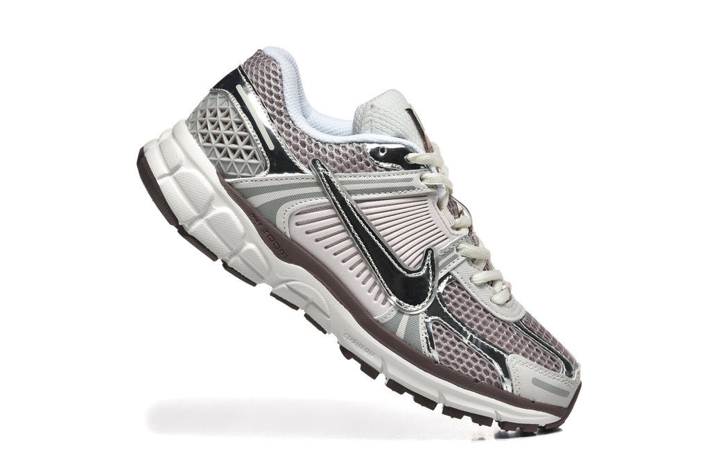 Nike Vomero 5 Trainers in Silver and Mauve - product image from the listing.
