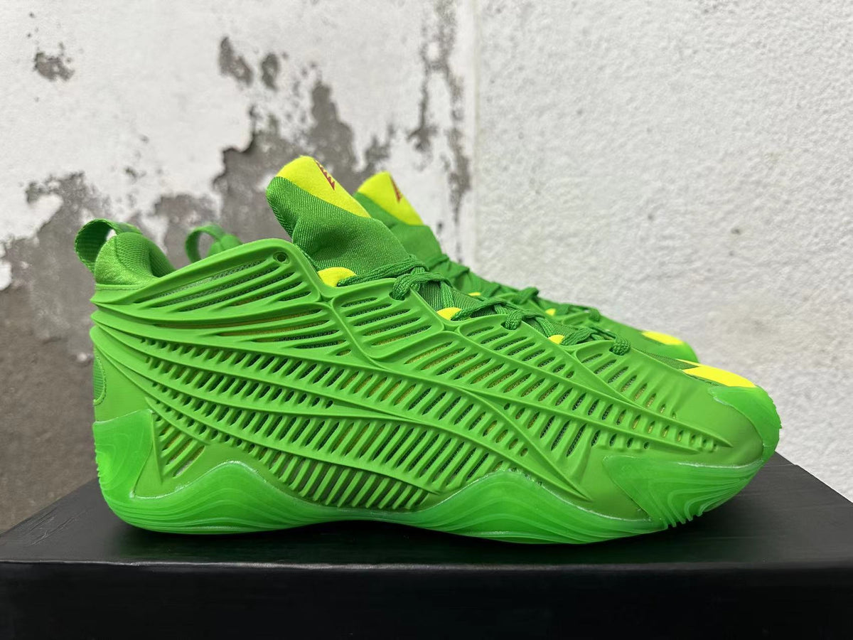 Adidas Green Basketball Trainers with Yellow Accents - product image from the listing.