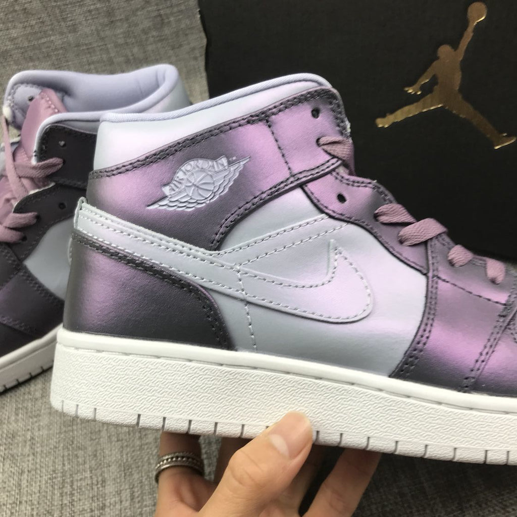 Jordan 1 Mid Sneakers in Purple AV5174-400 - product image from the listing.