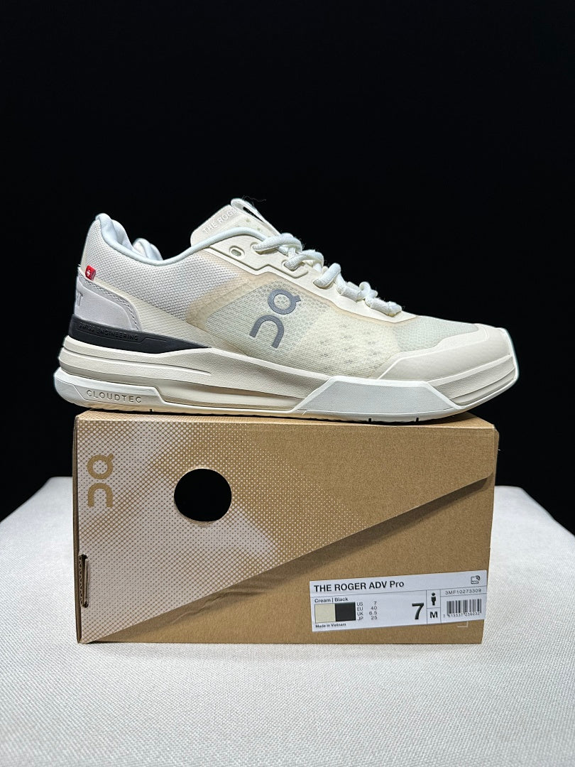 Cream and Black On The Roger Advantage Pro Sneakers - product image from the listing.