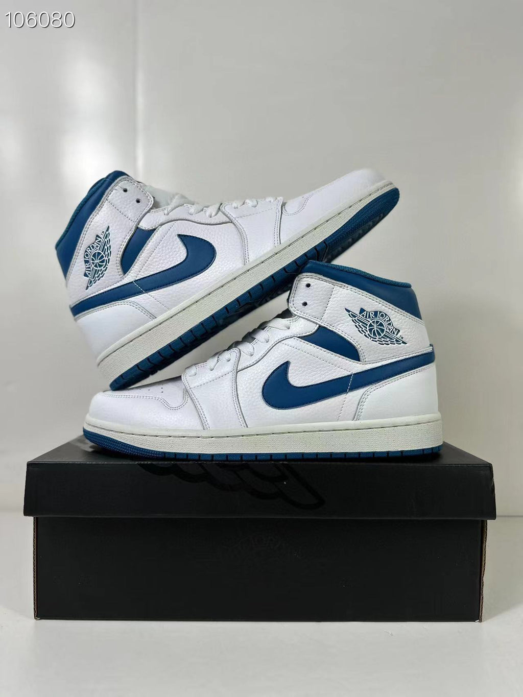 Air Jordan 1 Mid White Blue FN5215-141 Sneakers - product image from the listing.