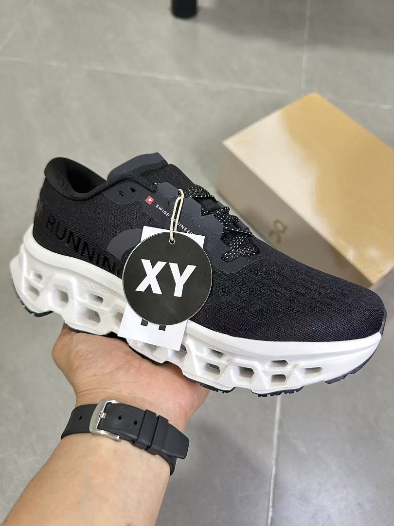 On Running Black and White Road Sneakers for Running - product image from the listing.