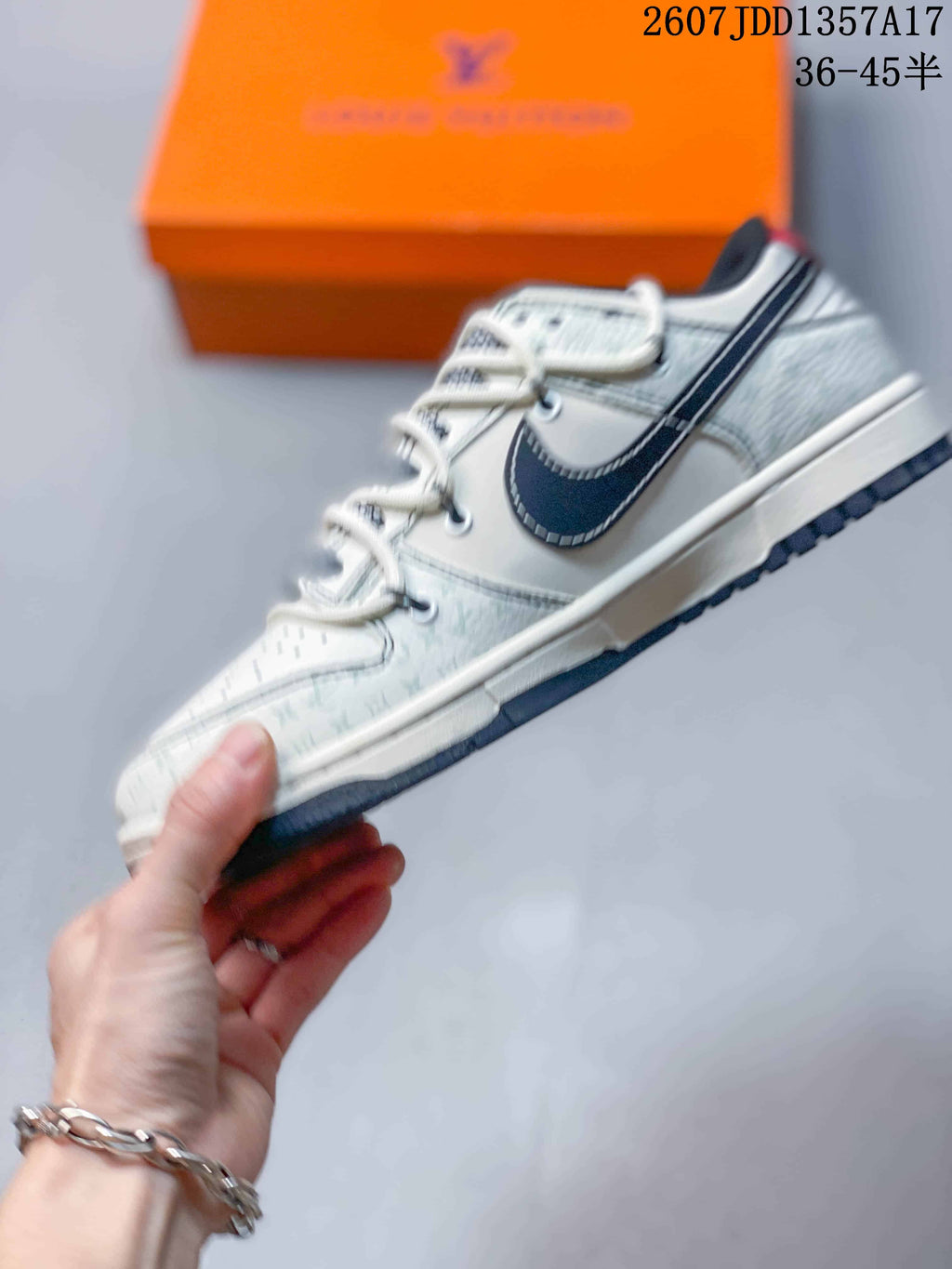 Nike SB Dunk Low White Black Double-Strap Trainers - product image from the listing.