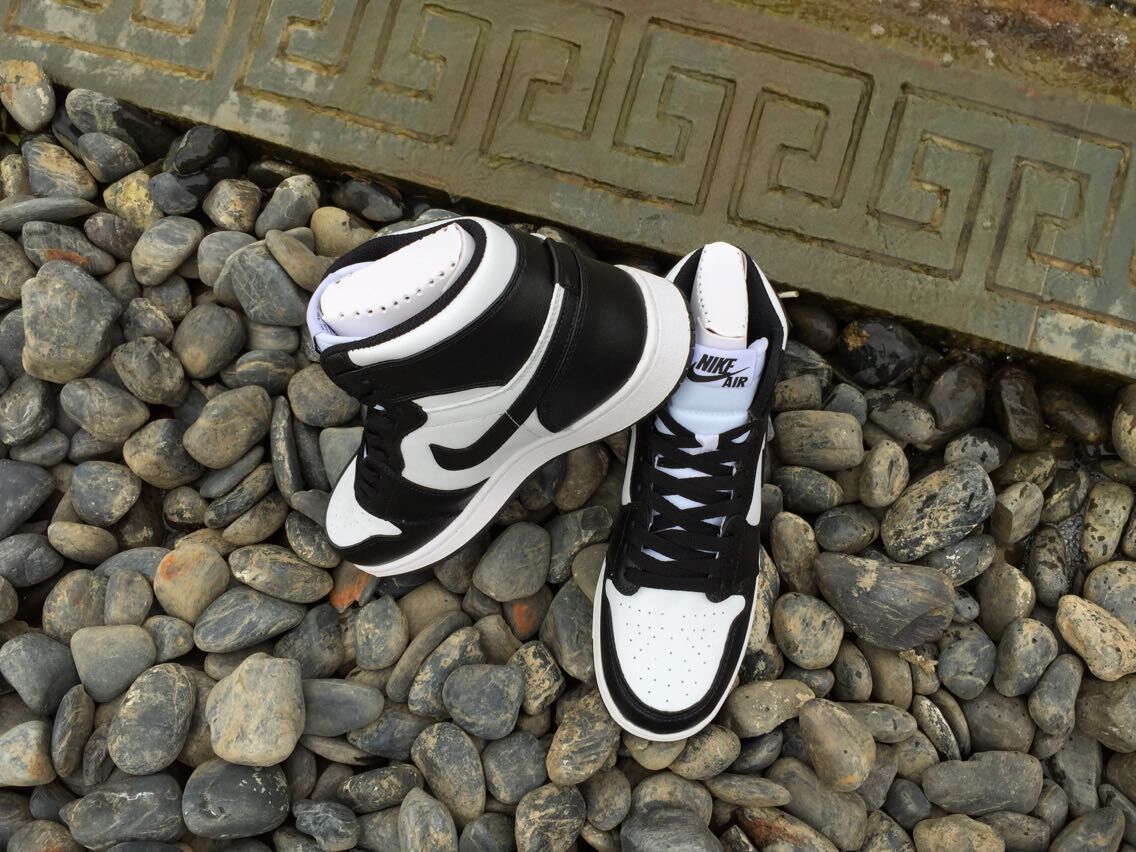 Women's Jordan 1 High Black and White Sneakers - product image from the listing.