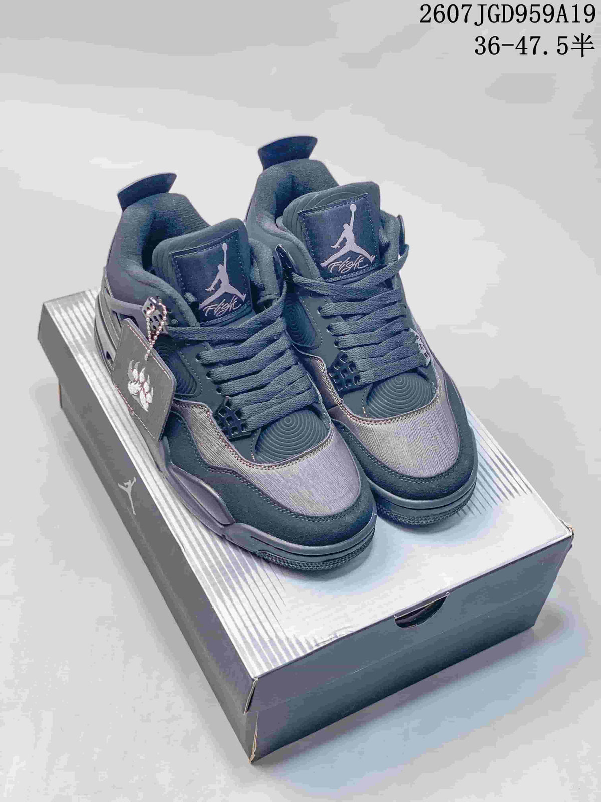 Air Jordan 4 Retro Dark Gray Sneakers JA8136 - product image from the listing.