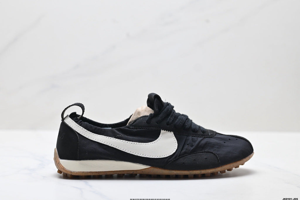 Jacquemus x Nike Jacumoon Sneakers in Black and White - product image from the listing.