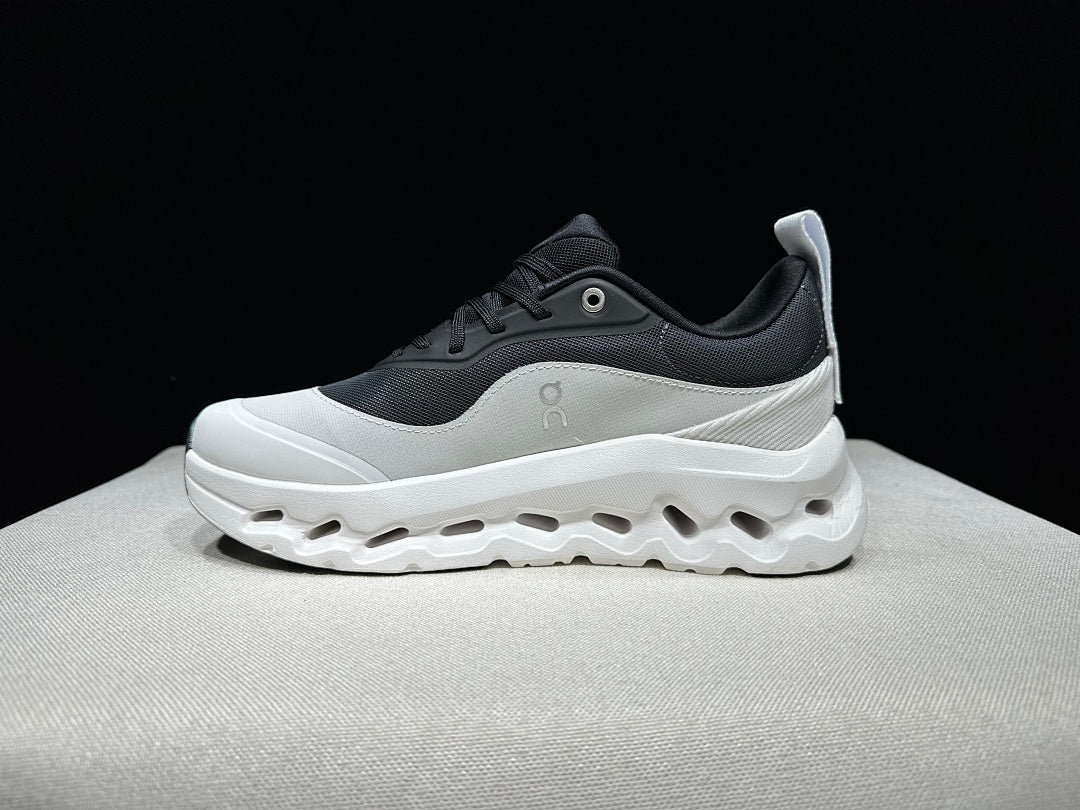 On Cloudtilt 2.0 Sneakers in White and Black - product image from the listing.