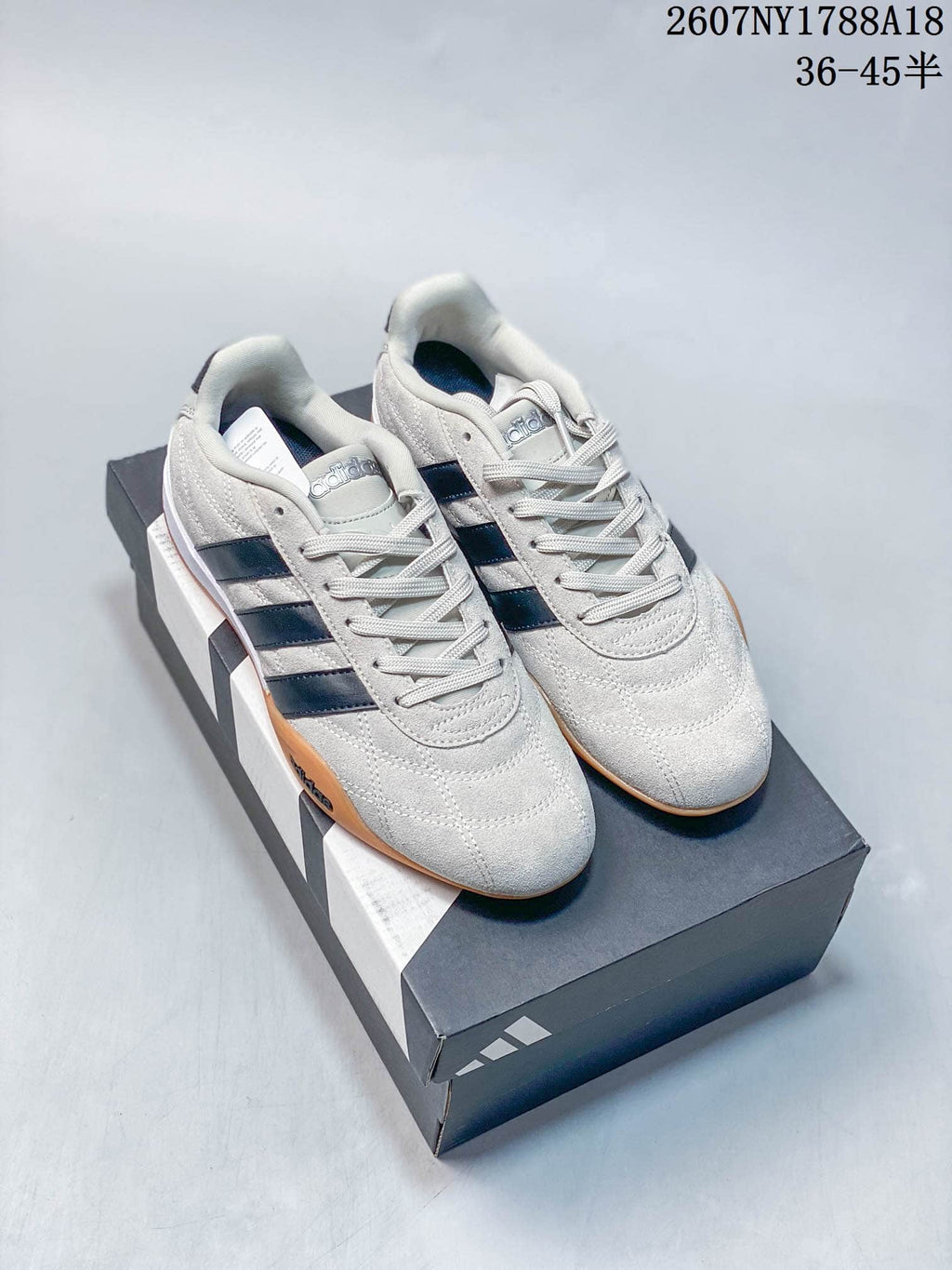 adidas Adipista Trainers in White Navy Gum EG8662 - product image from the listing.