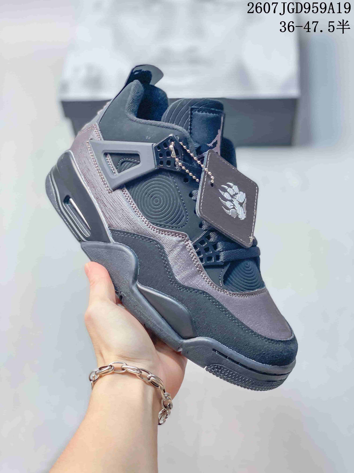 Air Jordan 4 Retro Dark Gray Sneakers JA8136 - product image from the listing.