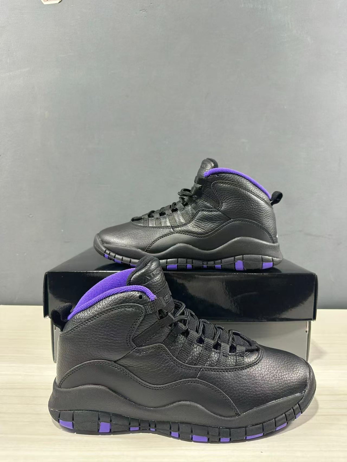 Air Jordan 10 High-Top Sneakers Black Purple 130209-051 - product image from the listing.