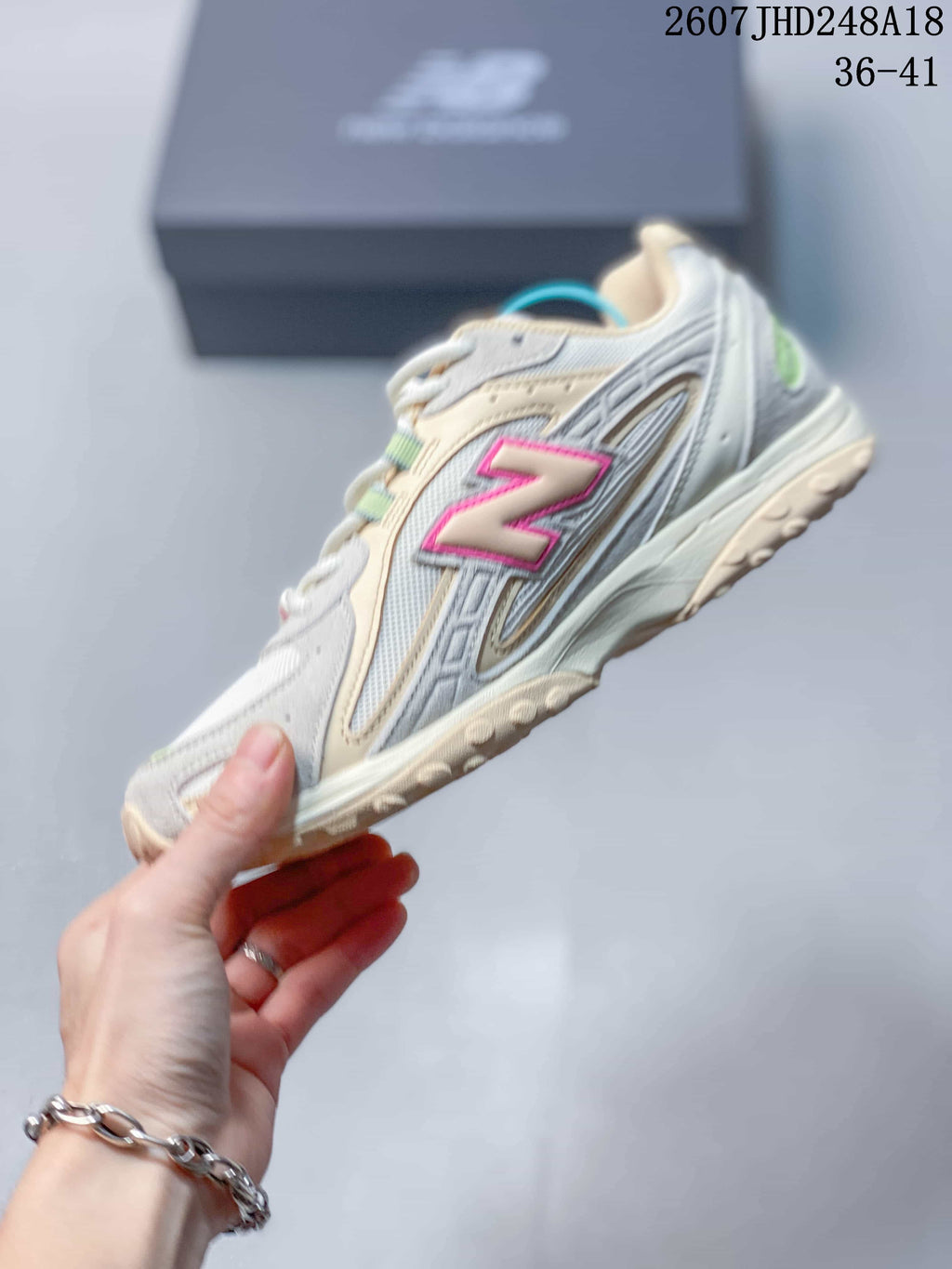 Cream and Gray New Balance 204L Low-Top Sneakers - product image from the listing.