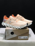 On Cloud 6 Coast Sneakers, in Cream and Orange - product image from the listing.