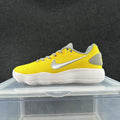 Nike Low-Top Sneakers in Yellow and Gray - product image from the listing.