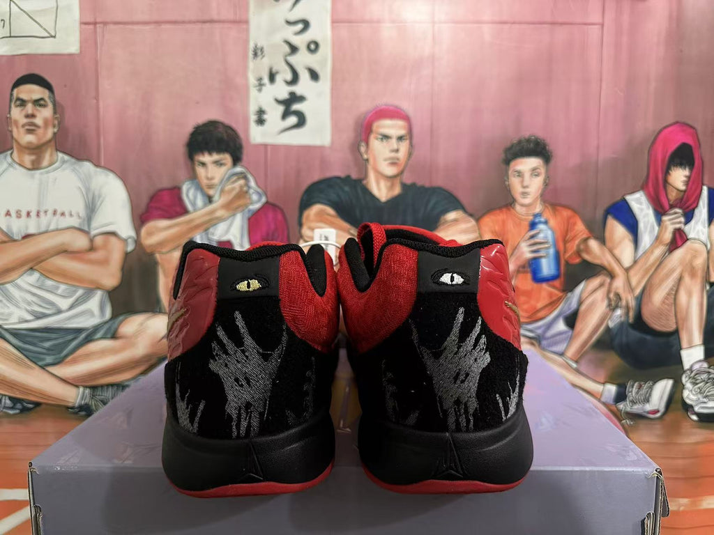 Nike Basketball Footwear Red and Black with Gold Swoosh - product image from the listing.