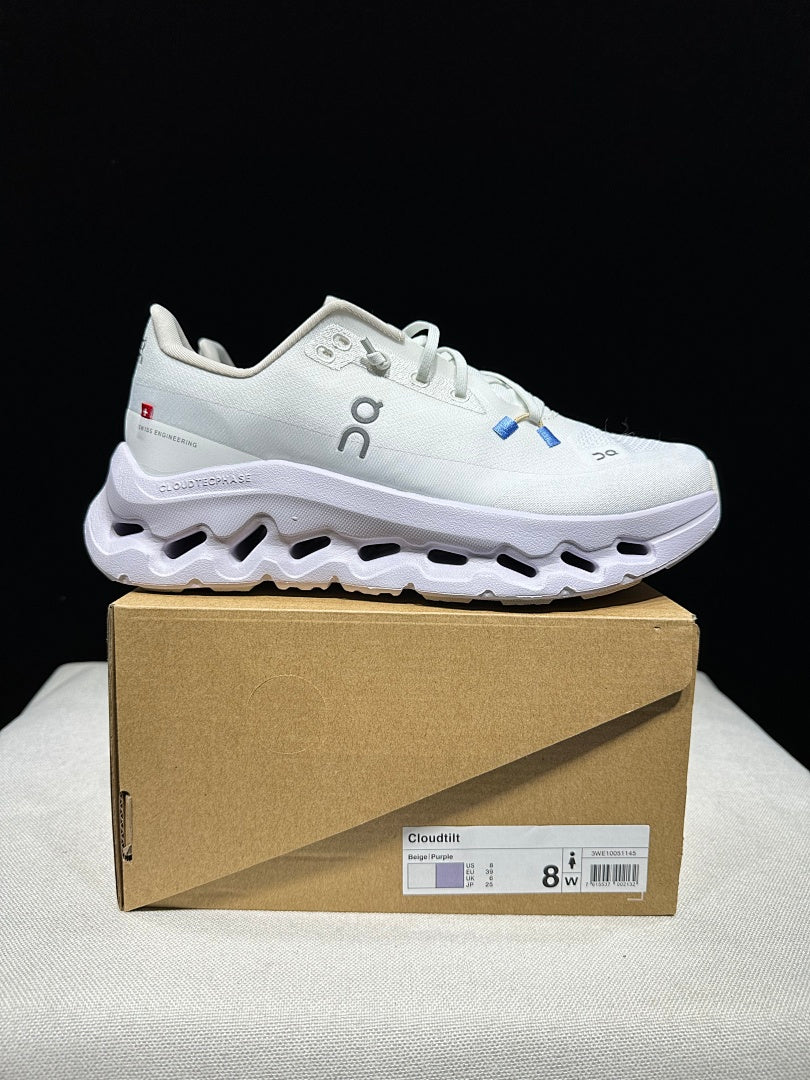 On Cloudtilt Trainers in White and Lavender - product image from the listing.