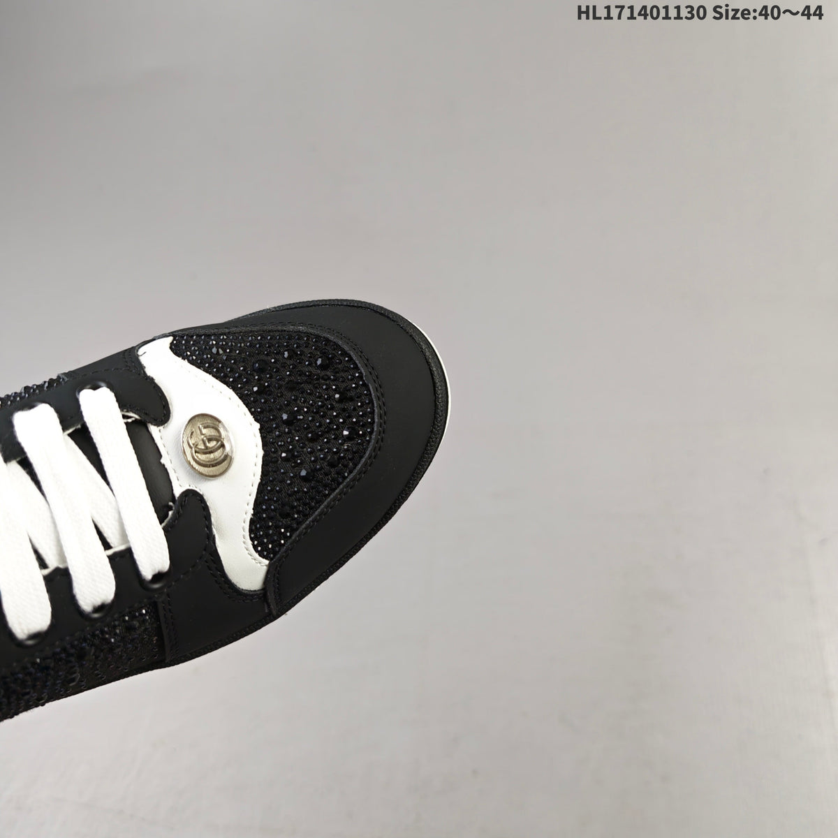 Gucci Screener Distressed Low-Top Sneakers in Black and White HL171401130 - product image from the listing.