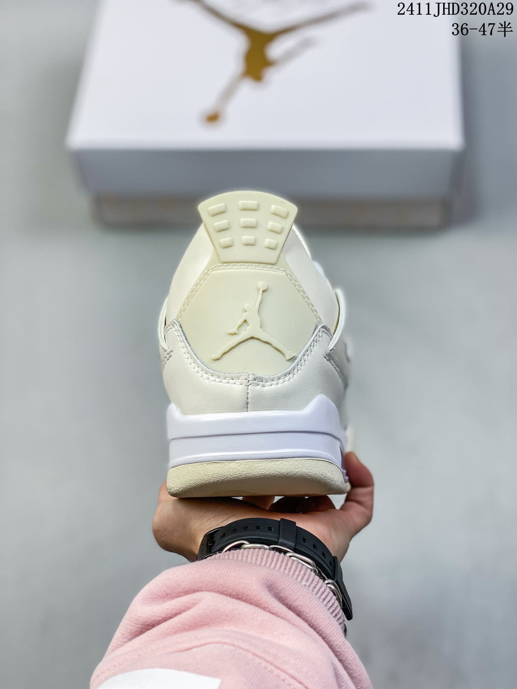 Nike Air Jordan 4 Retro Sneakers in White Gold 2411JHD320A29 - product image from the listing.