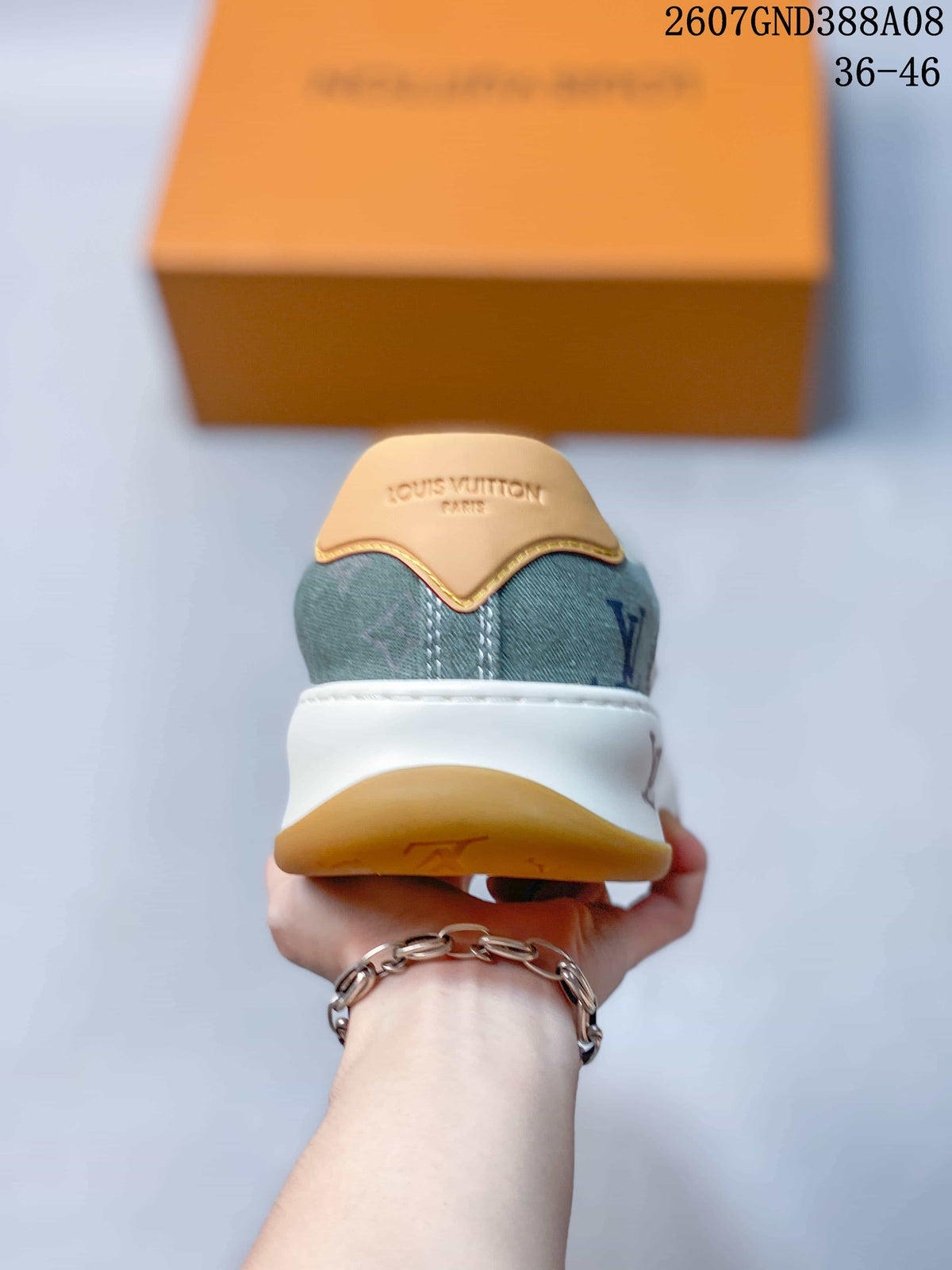 Louis Vuitton Tilted Low-Cut Sneakers in Green Monogram - product image from the listing.