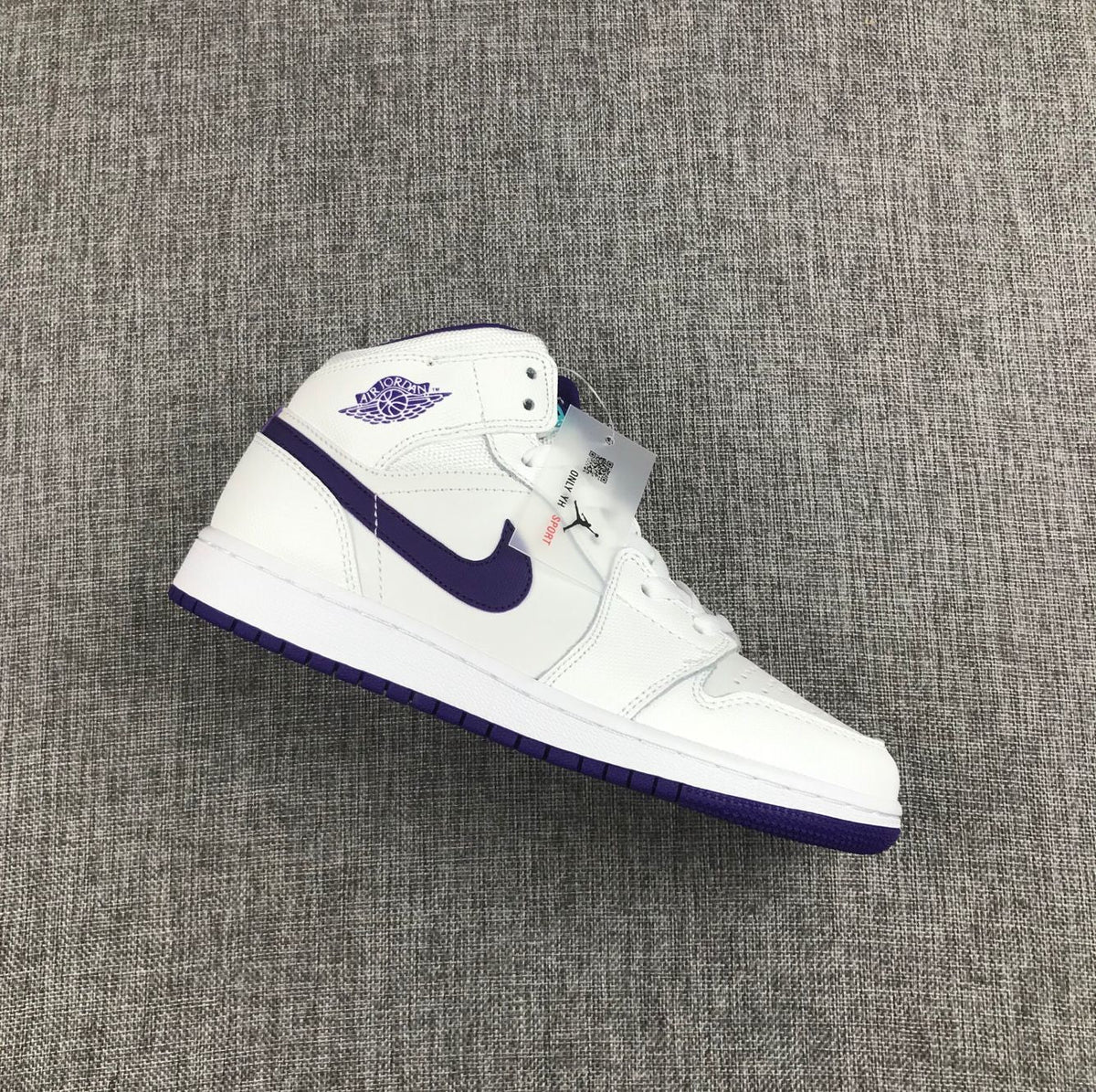 Air Jordan 1 Mid Sneakers in White Purple 332148-137 - product image from the listing.