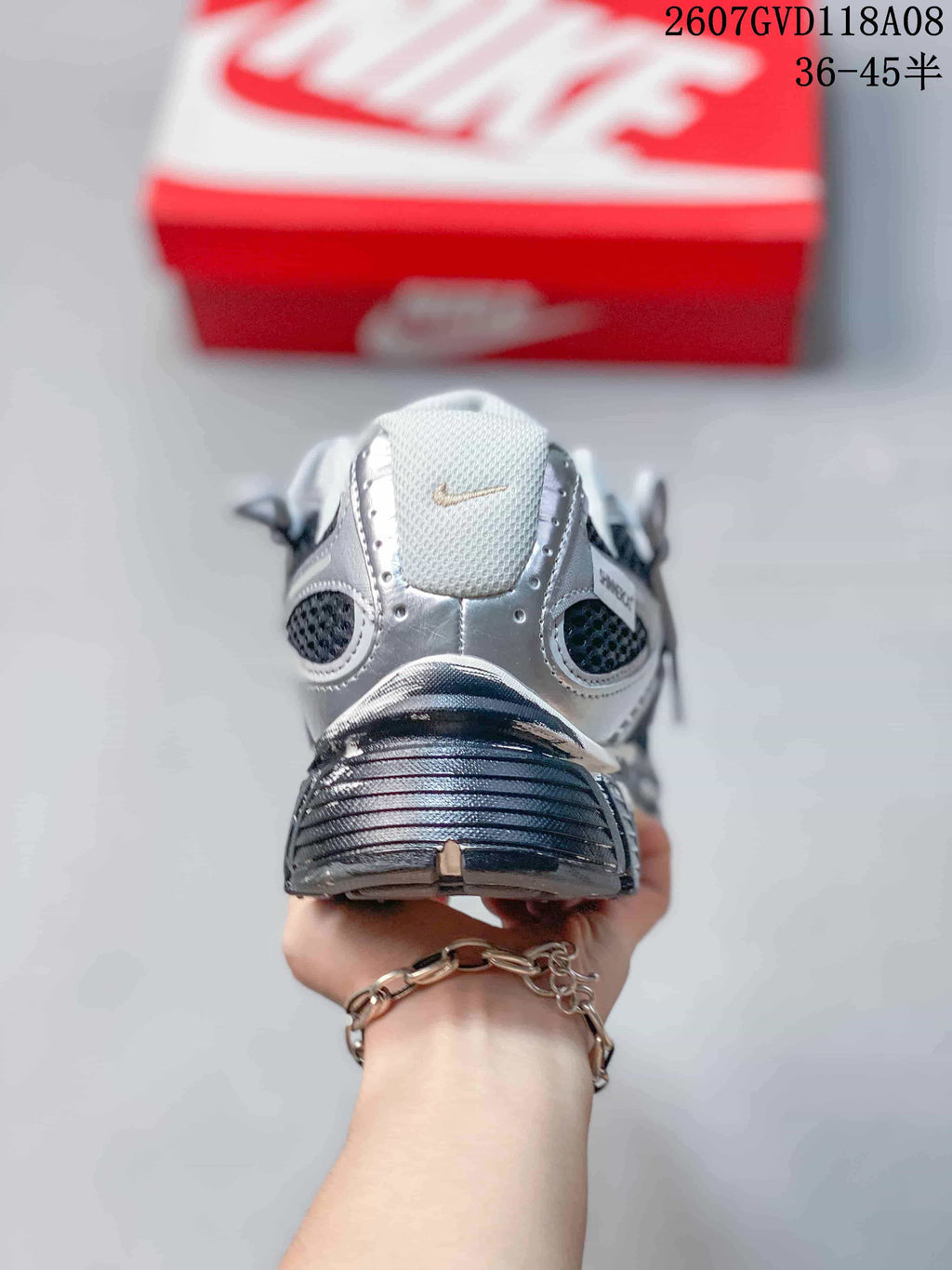 Nike V5 RNR Sneakers in White Silver Black - product image from the listing.