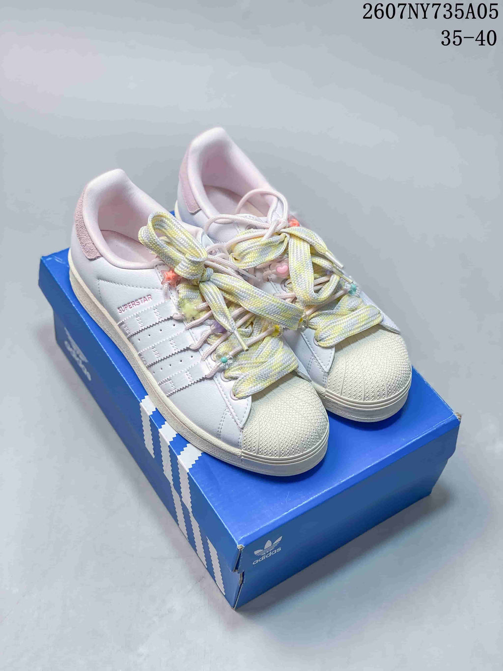 Adidas Superstar Custom White Trainers with Pastel Laces - product image from the listing.