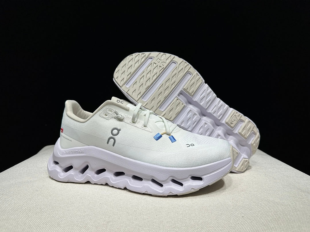 On Cloudtilt Trainers in White and Lavender - product image from the listing.