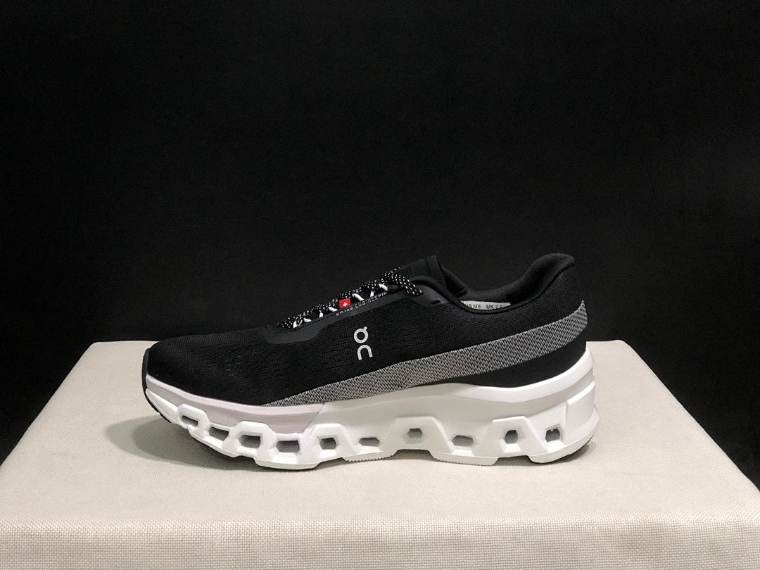 On Cloudmonster 2 Running Shoes in Black White - product image from the listing.