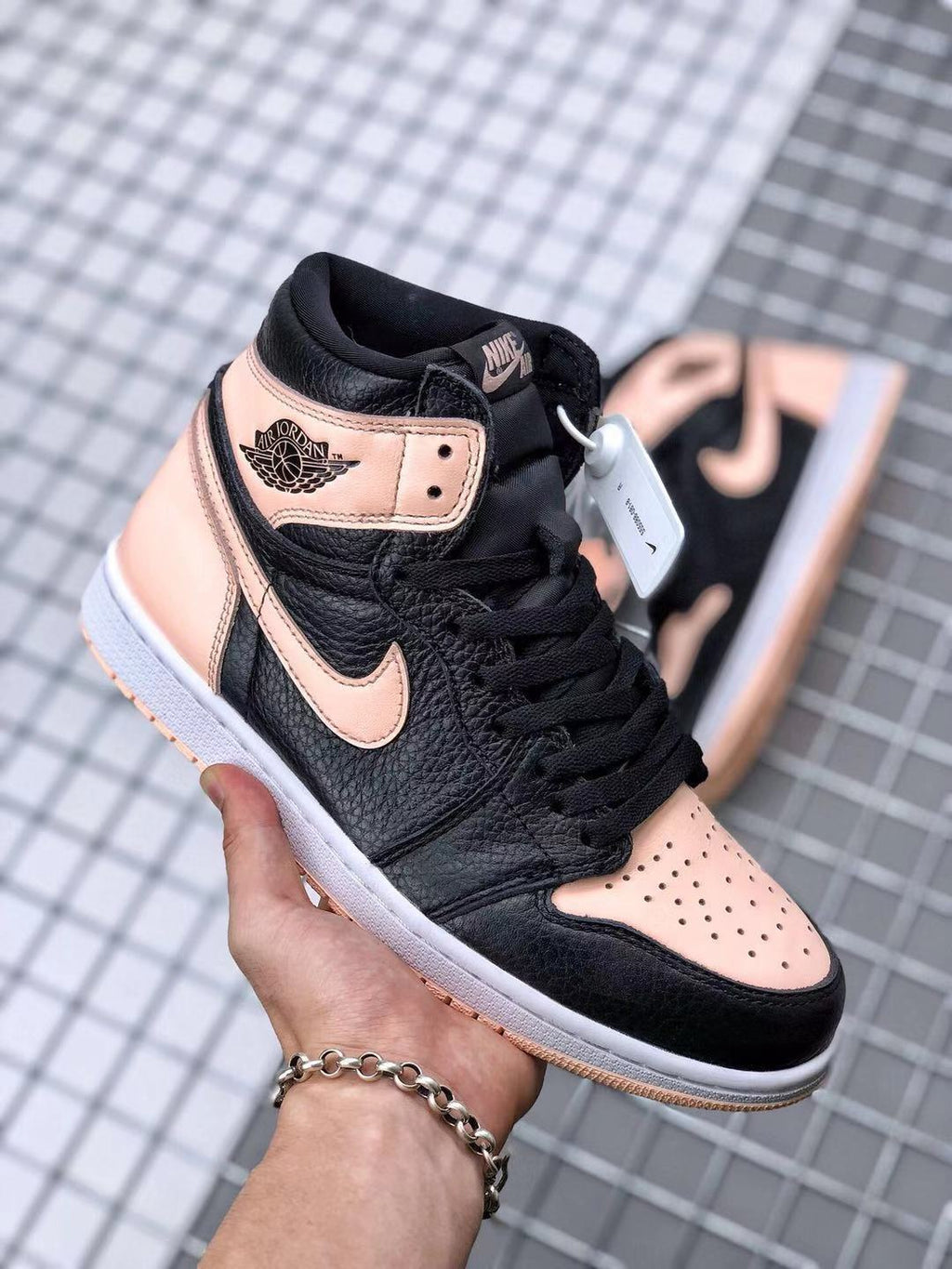 Air Jordan 1 High OG Crimson Tint Sneakers in Black Pink - product image from the listing.
