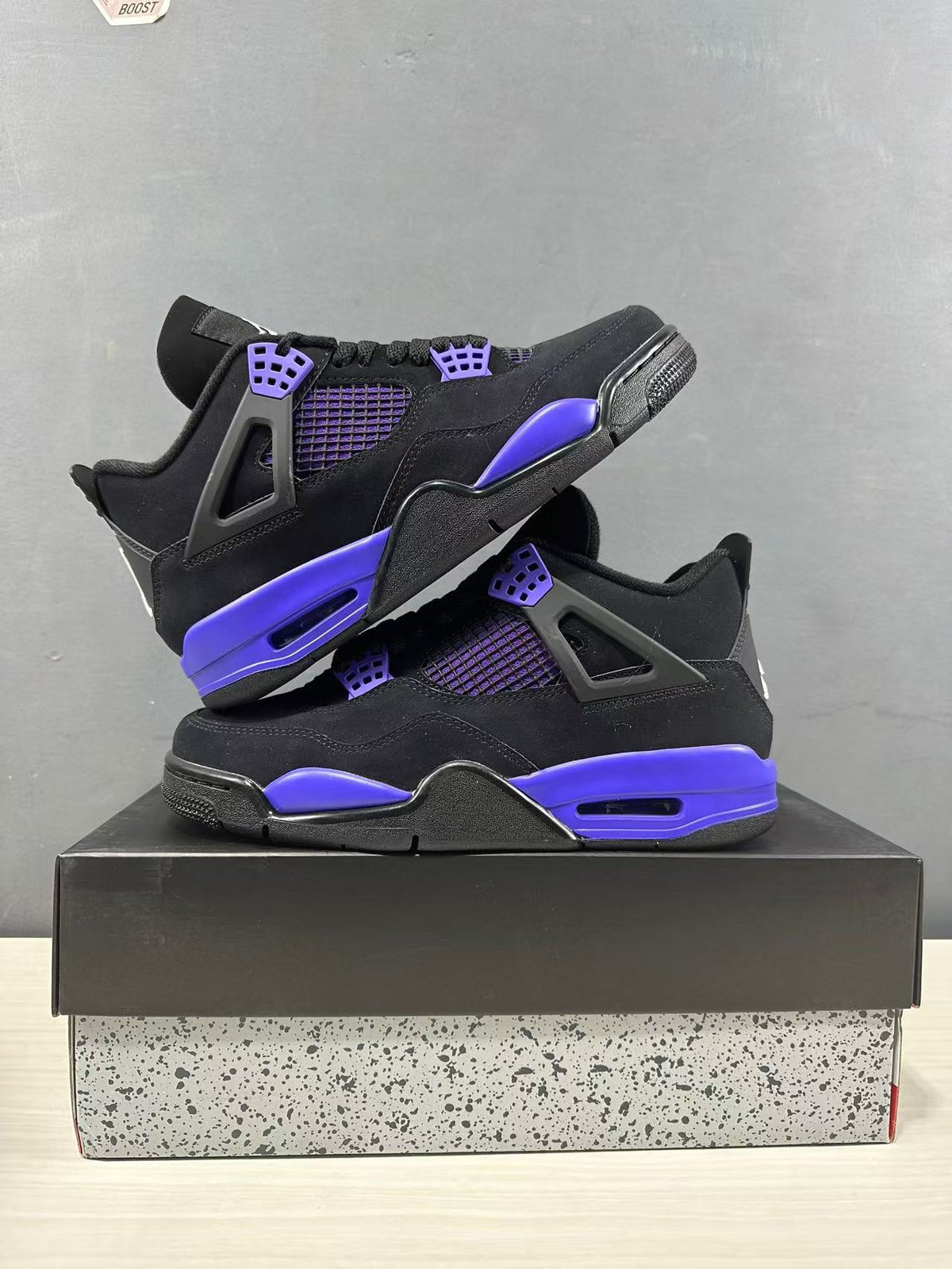Air Jordan 4 Retro Black Blue Sneakers CT8527-018 - product image from the listing.