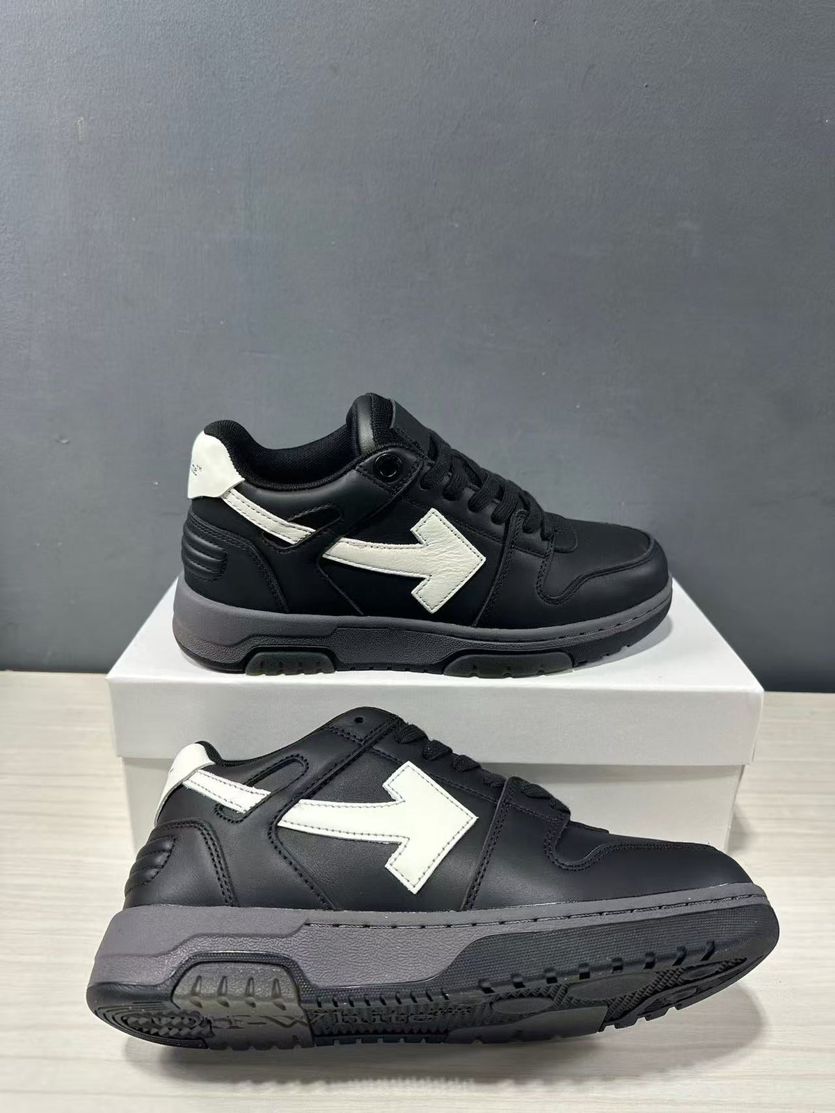 Off-White Out Of Office Low-Top Sneakers in Black White OWIA189C99LEA0061001 - product image from the listing.