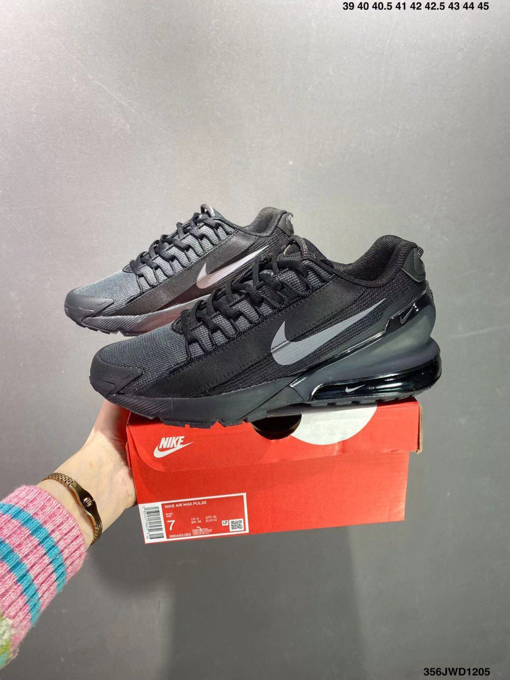 Black and Gray Nike Air Max Pulse Sneakers - product image from the listing.