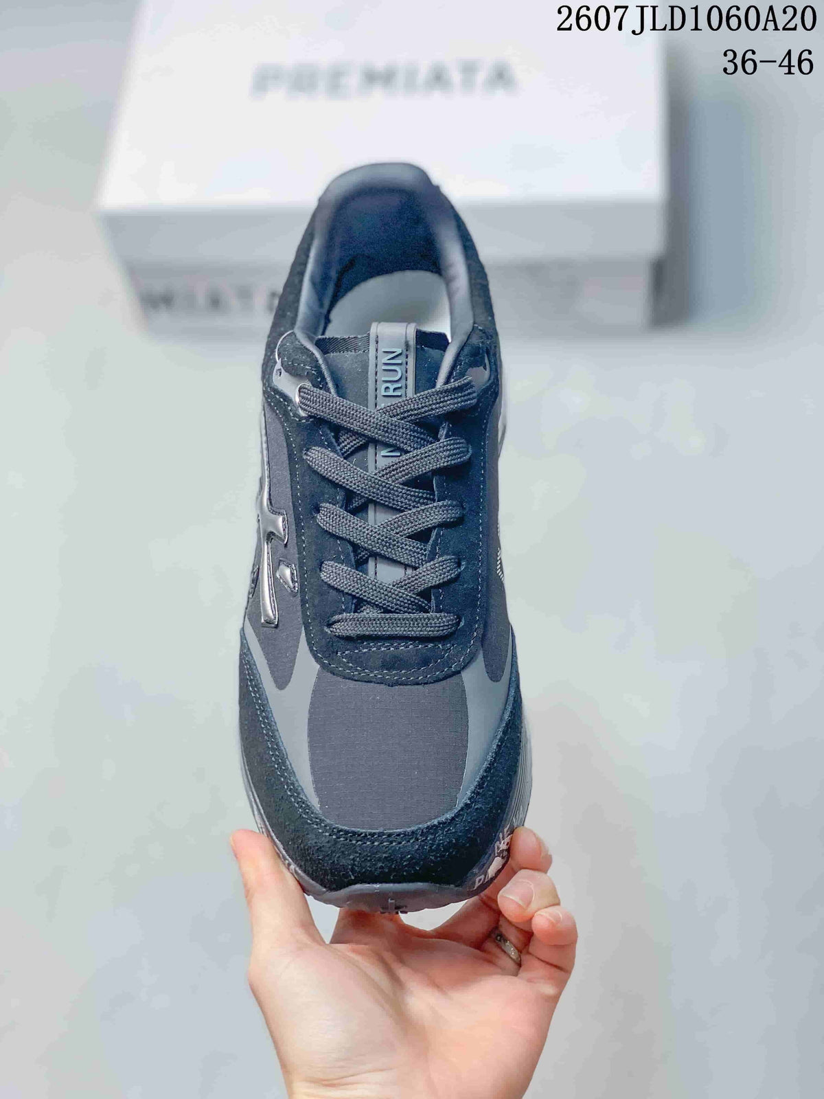 Premiata Lander Trainers in Black and Gray 712800TIT - product image from the listing.