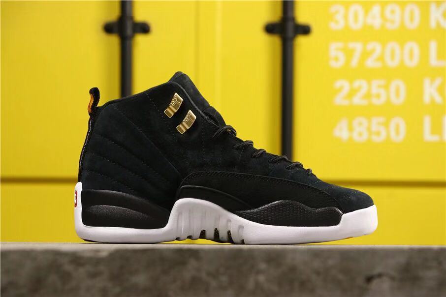 Air Jordan 12 Reverse Taxi Sneakers Black 153265-017 - product image from the listing.