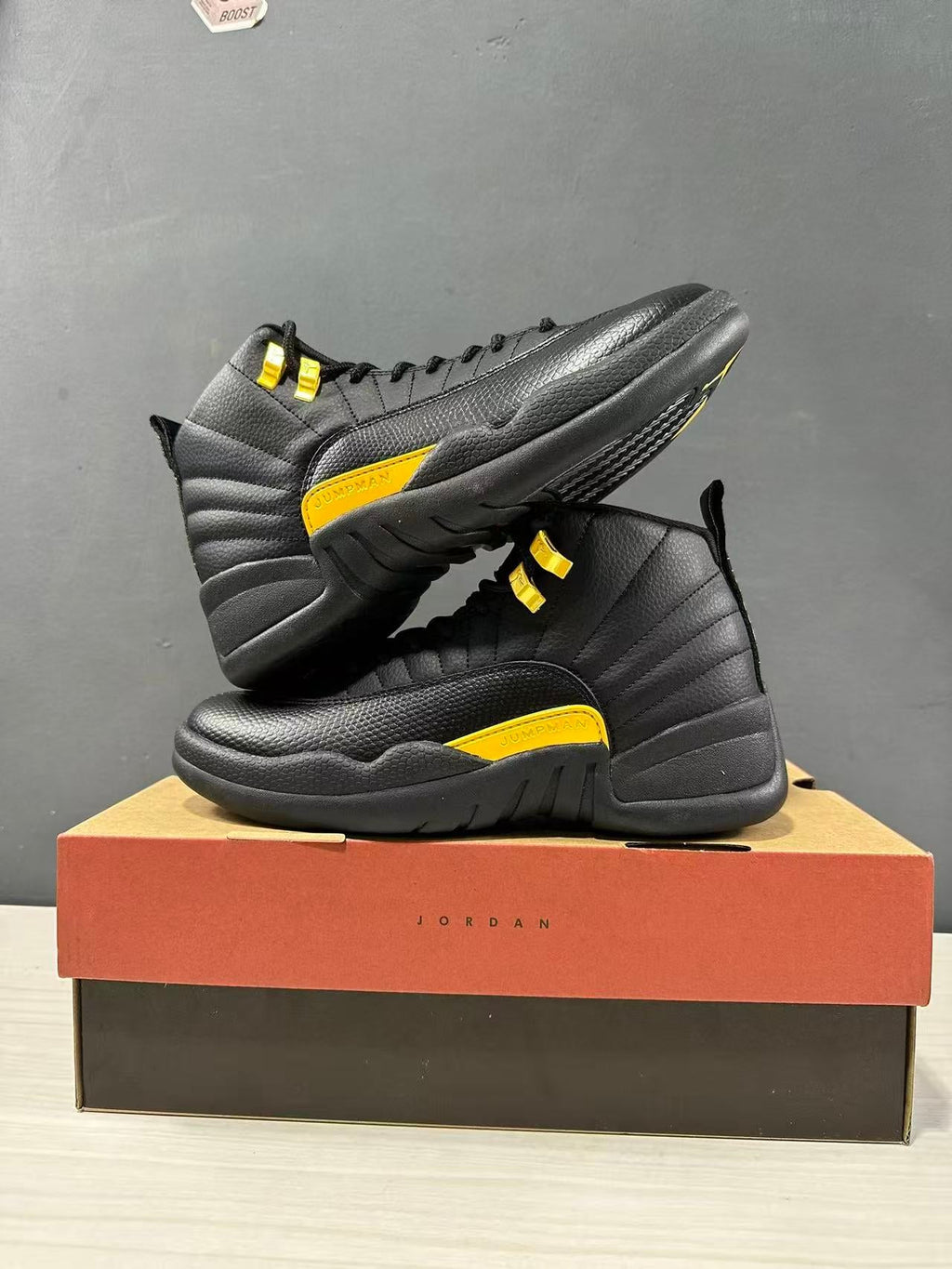 Air Jordan 12 Retro Black Taxi Sneakers CT8013-071 - product image from the listing.