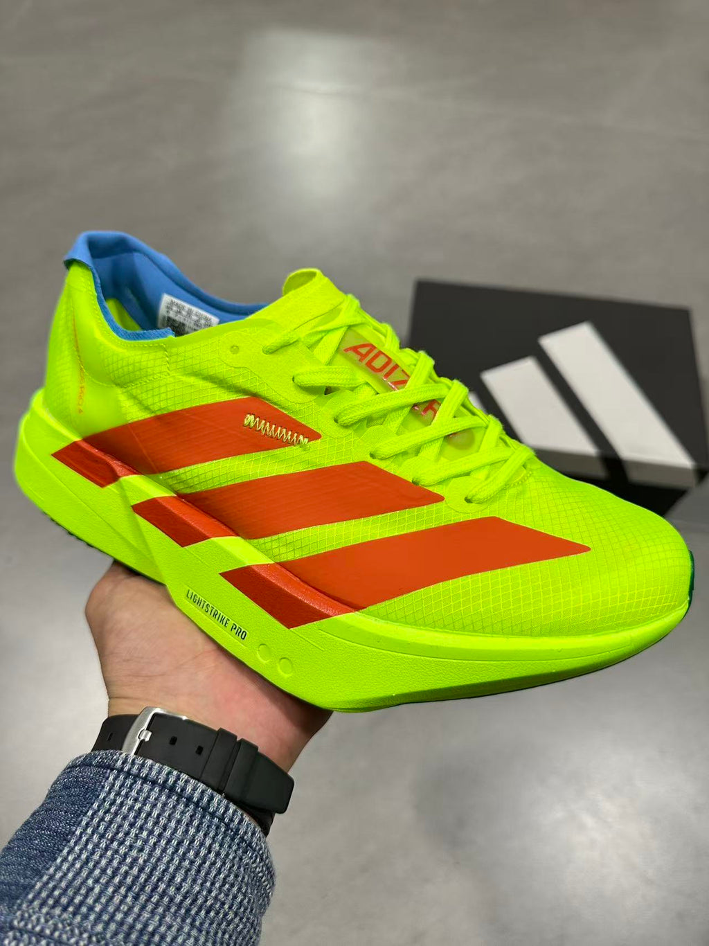 Nike Lightstrike Pro JQ1571 Running Shoes, in Volt Orange - product image from the listing.