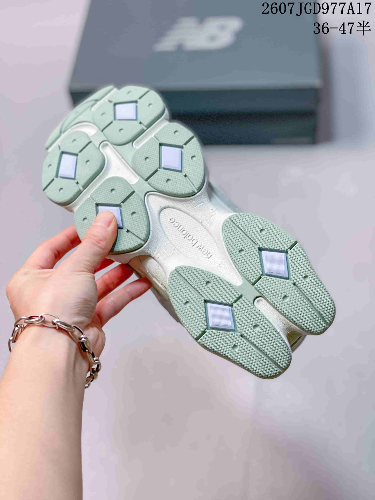 New Balance 9060 Sneakers in Mint Green and White - product image from the listing.