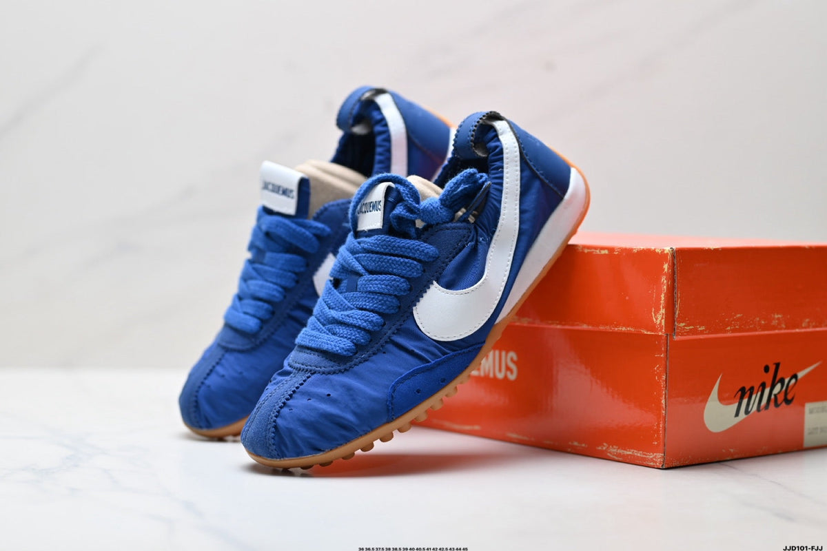 Jacquemus x Nike Jacumoon Low-Top Sneakers, in Blue and White - product image from the listing.