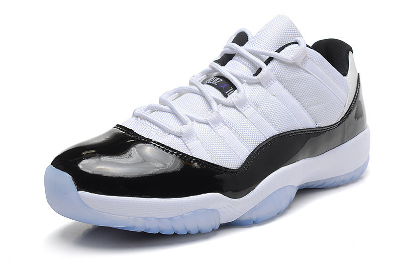 Air Jordan 11 Low Basketball Sneakers in White Black - product image from the listing.
