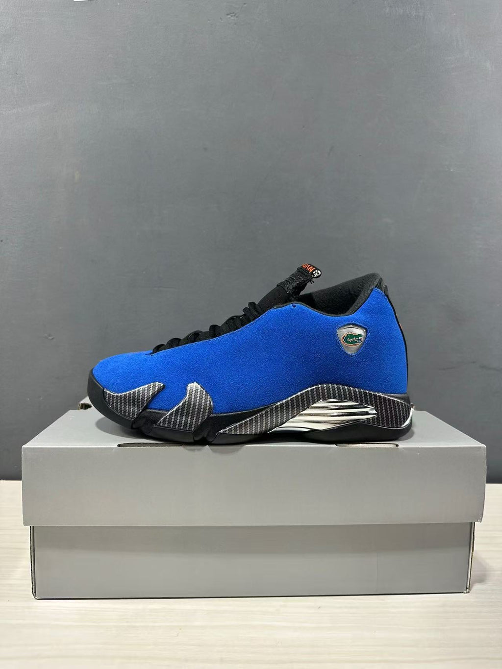 Air Jordan 14 Retro Florida Gators Blue Sneakers FA4616-172 - product image from the listing.