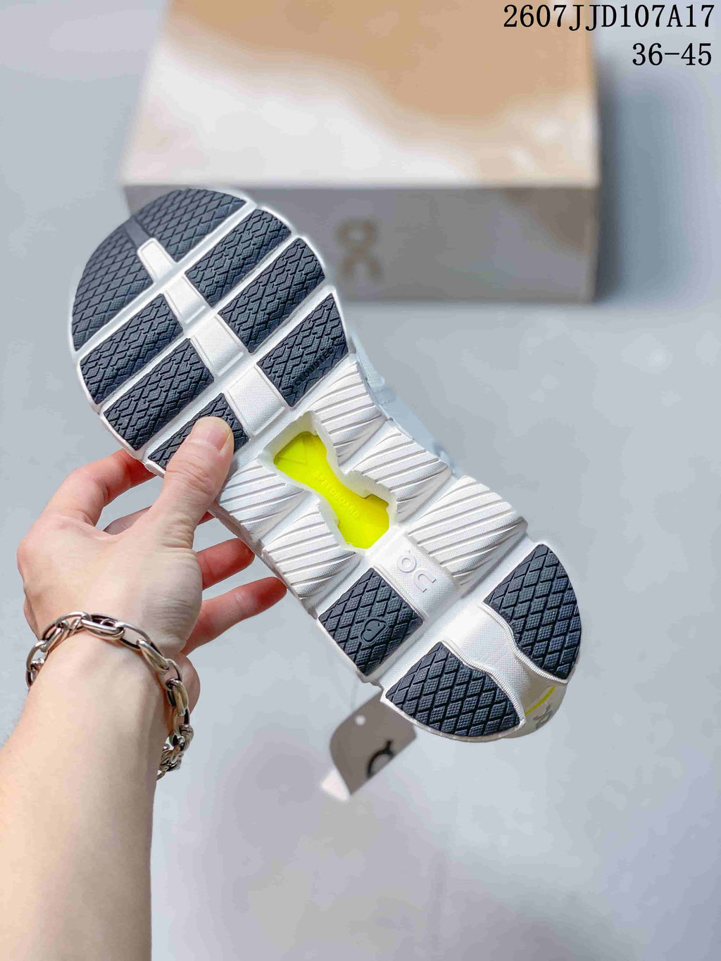 On Running Cloud X 4 AD Sneakers in White Lime 2607JJD107A17 - product image from the listing.
