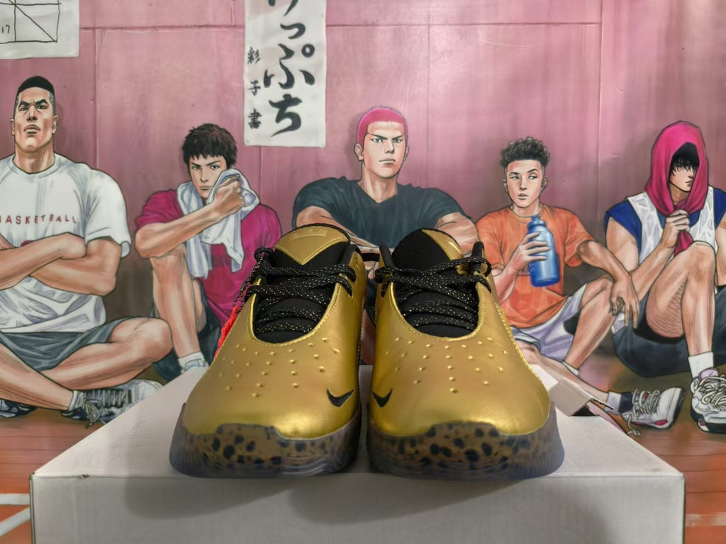 Metallic Gold and Black Nike Basketball Shoes - product image from the listing.