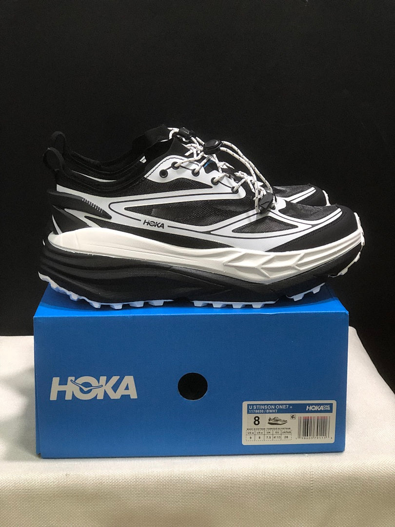 HOKA Stinson One 7 Black and White Trail Trainers - product image from the listing.