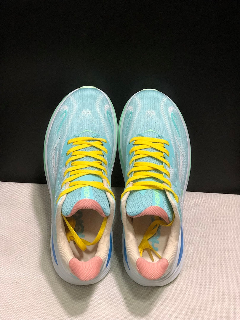 Aqua and Yellow HOKA Clifton 10 Running Shoes - product image from the listing.