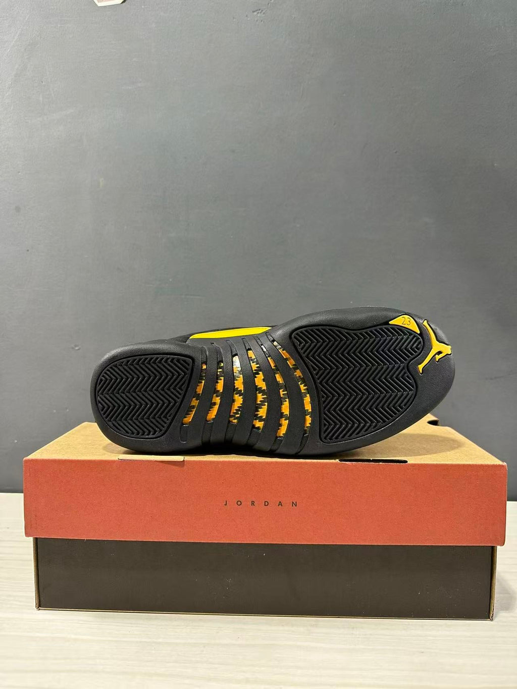 Air Jordan 12 Retro Black Taxi Sneakers CT8013-071 - product image from the listing.