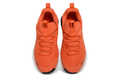 Orange and Black Nike Free Sneakers - product image from the listing.